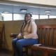 Can Cleveland reduce harm eviction does to Black families: Black woman in jacket sits on bench