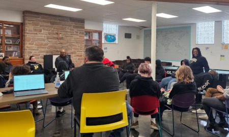 Letting vouchers fund Indiana microschools could spur innovation, but also a fight for cash: group of students and teachers in a discussion in a classroom